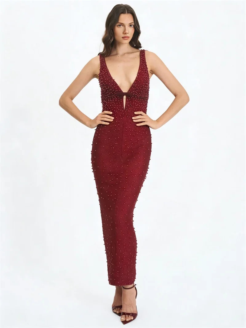 Pearl embellished deep plunge V-neck sleeveless red formal gown