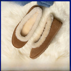 Fleece lined slip on loafers on white fluffy surface