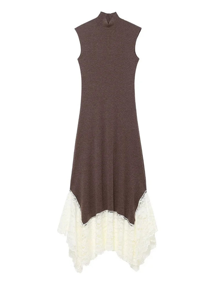 Brown dress with white lace hem on a white background
