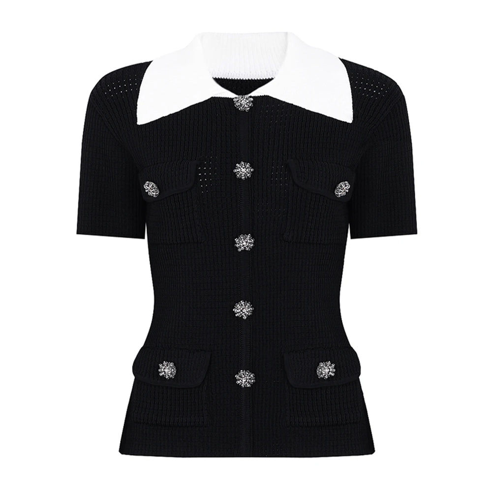 Black knit cardigan with white collar and crystal buttons