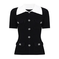 Black knit cardigan with white collar and crystal buttons
