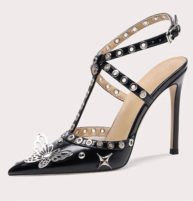 Black high-heeled sandal with decorative straps on a white background