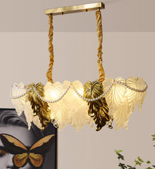 Decorative chandelier with leaf design on a neutral background