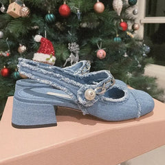 Women’s summer slip-on mules in distressed denim with open toe

