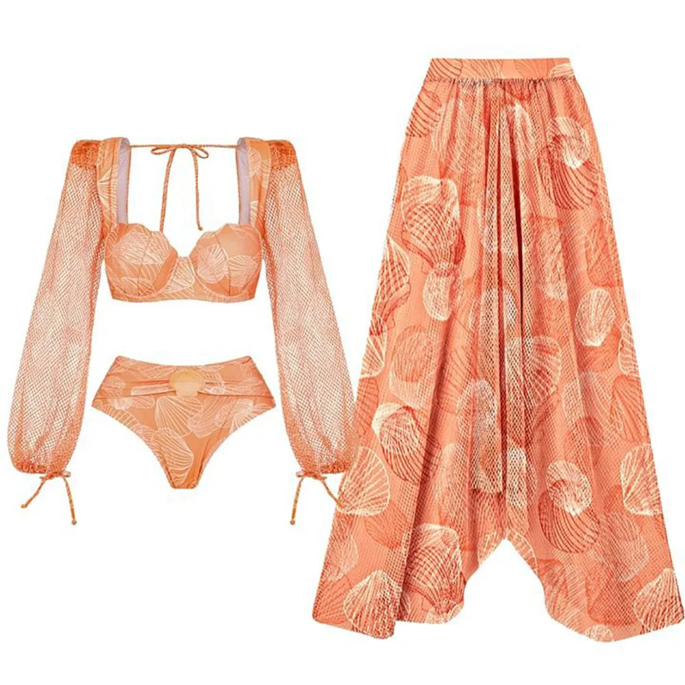 Detail of orange ruched bikini top and high-waisted bottoms with sheer long sleeves and seashell print