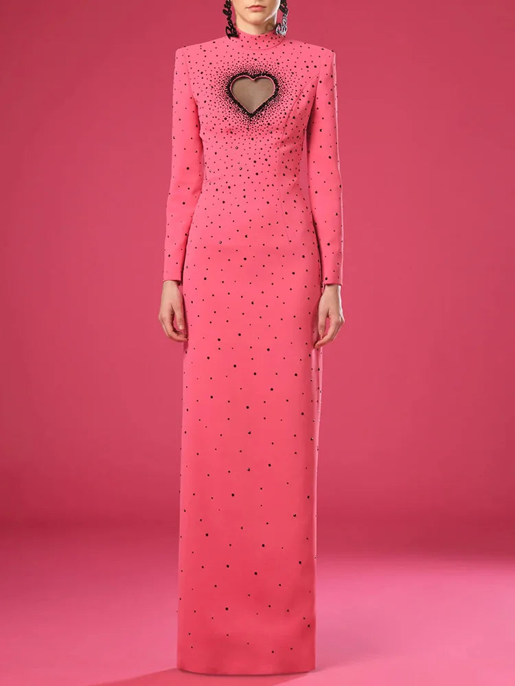 Pink maxi dress with heart cutout back and scattered embellishments