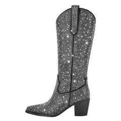 Decorative cowboy boot with rhinestone embellishments on a white background