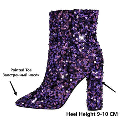 Detail of pointed toe and heel height on sequined boots
