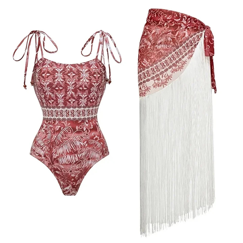 Floral print one-piece swimsuit and fringed sarong set.