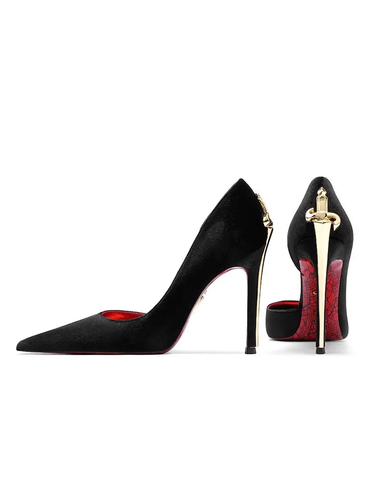 Black high-heeled shoes with red interior and gold accents on a white background