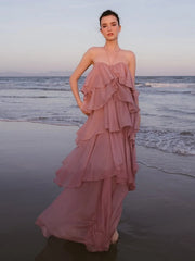 Strapless ruffled chiffon maxi dress at beach