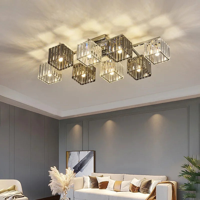 Modern silver ceiling light with crystal cube design and dimmable LED bulbs mounted in a luxury living room.