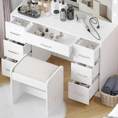 "Lighted makeup table with drawers for bedroom setup"

