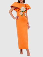 Orange dress with floral embroidery on a white background