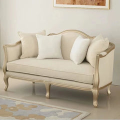 Elegant American-style couch with rolled arms and decorative pillows