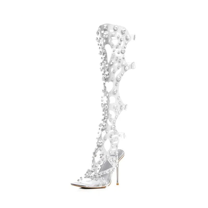 Clear high-heeled shoe with floral embellishments