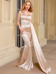 Golden Atelier maxi dress in satin with a one-shoulder design, padded shoulder detail, and a flowing skirt. Ivory