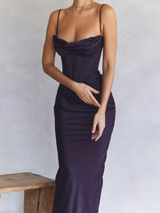 A women wearing elegant evening gowns in , purple.