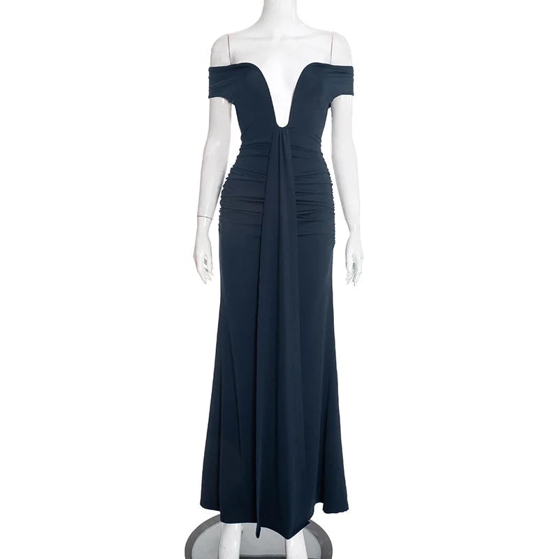 Navy blue off-shoulder evening gown on a mannequin against a white background