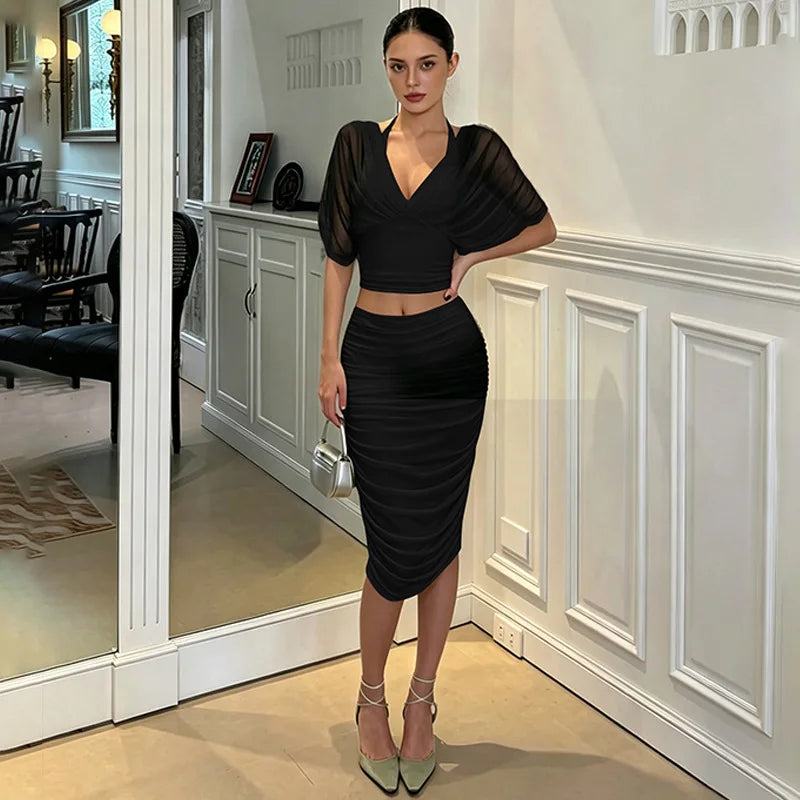 Black V-neck draped sleeve crop top and ruched midi skirt set