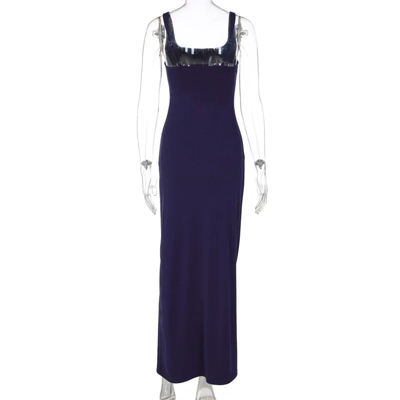 Navy blue evening gown on a mannequin against a white background