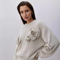  Women's knit sweater with a 3D rose design.