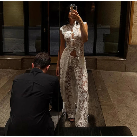 Sleeveless mock neck lace top and wide leg pants suit