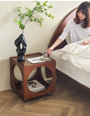 A minimalist Scandinavian corner table crafted from solid wood, placed in a cozy living room corner. D