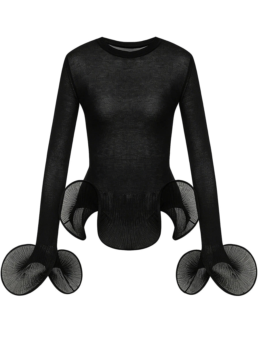 Black sheer knit top with flared pleated sleeves and ruffled hem on a mannequin
