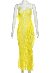  Women's lace dress with a high slit and ruffle details.