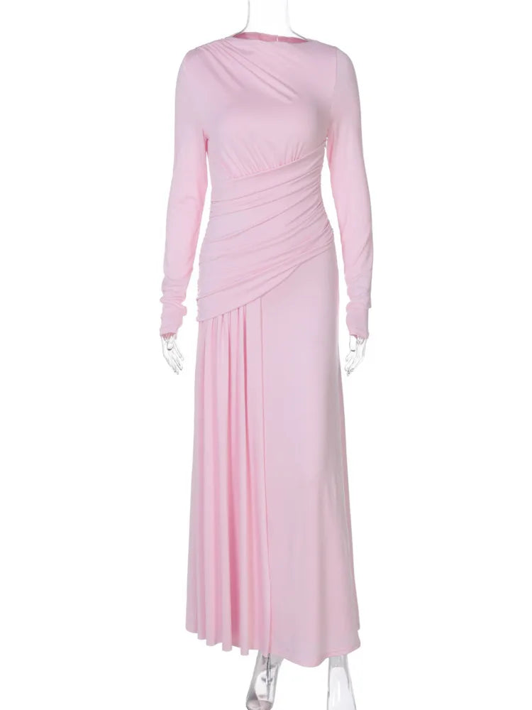 Pink dress on a mannequin against a white background