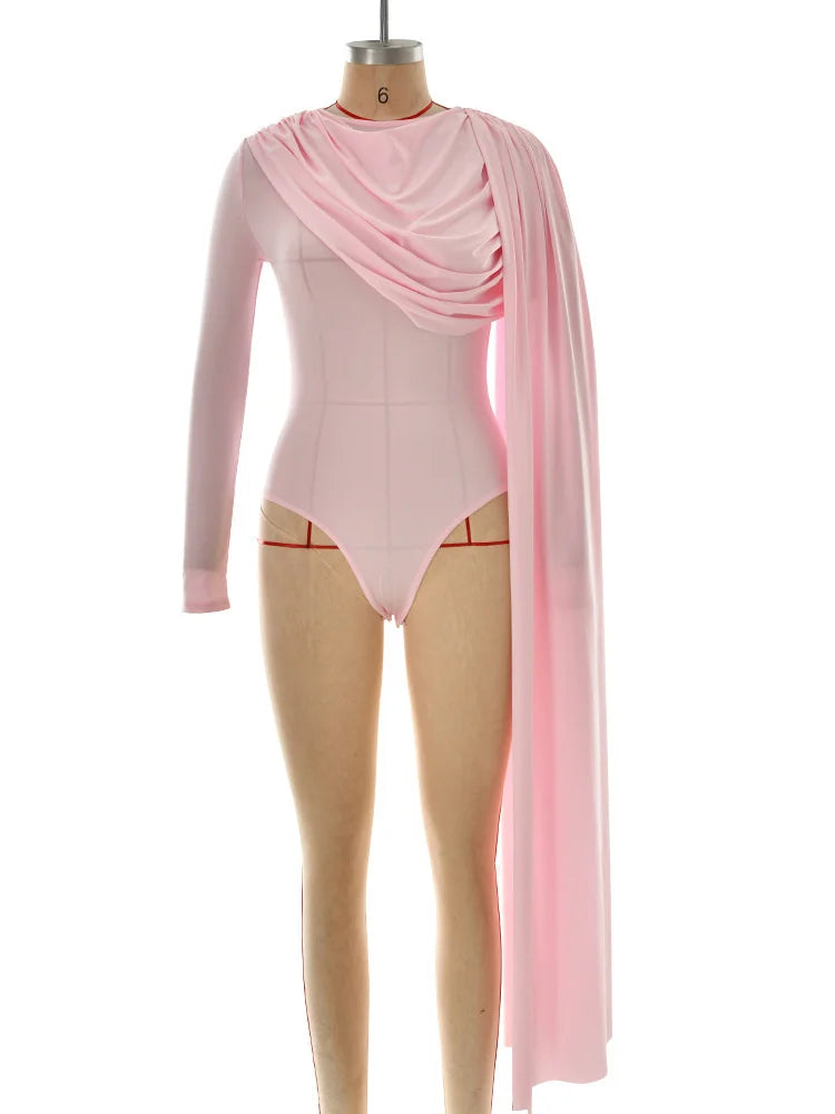 Pink leotard with draped fabric on a mannequin against a white background