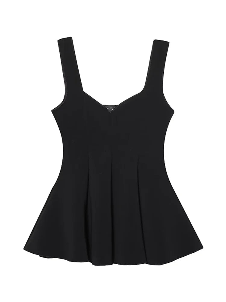 Black top with thin straps on a white background