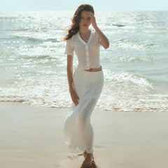 Stylish knitted V-neck short set with hollow-out details.