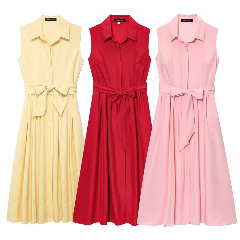 Three sleeveless dresses in yellow, red, and pink 