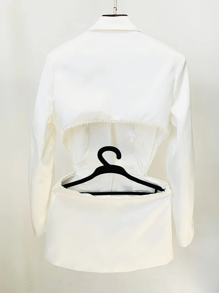 White blouse on a mannequin with a black hanger inside, against a white background