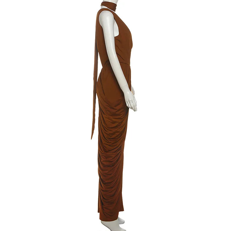 Brown evening gown on a mannequin against a white background