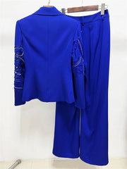Back view of beaded crystal blazer and wide-leg trouser suit