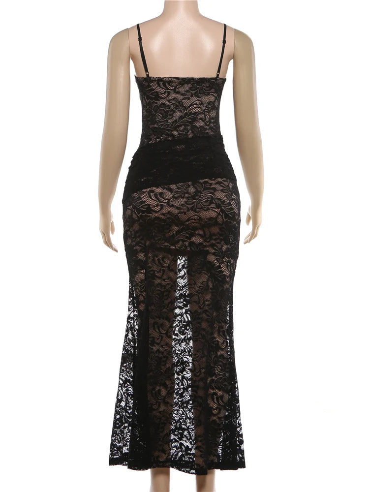 Black lace dress on a mannequin against a white background