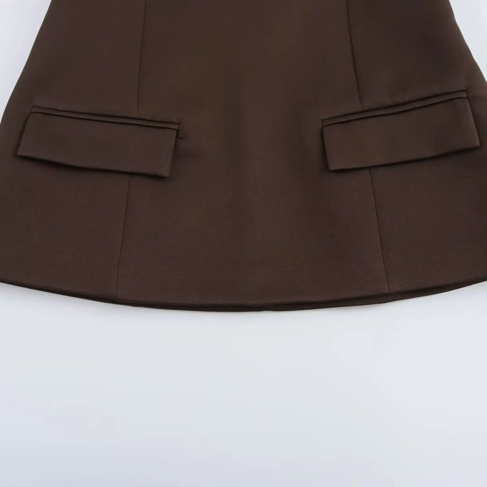 Brown blazer with two front pockets on a white background