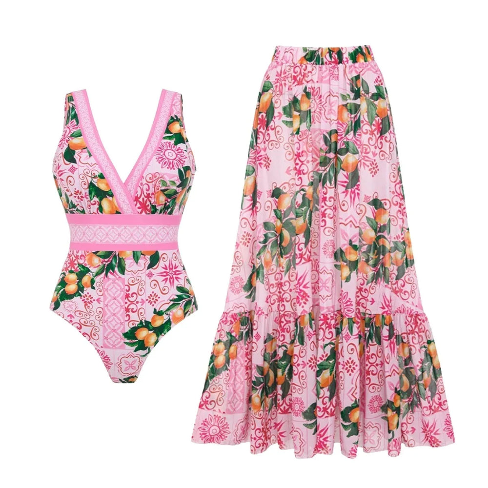 Pink graphic print two-piece swimwear set laid out flat.