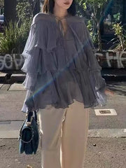 Long sleeve blouse with butterfly sleeves and cascading tiers