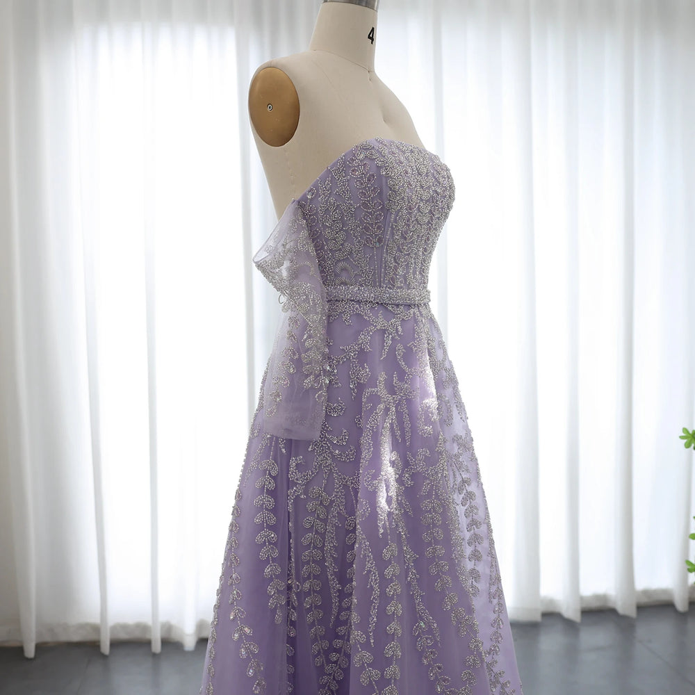 Lavender evening gown on a mannequin against a white curtain background