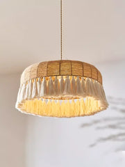 Close-up of a hemp rope pendant light, showcasing the intricate weaving and natural texture of the hemp fibers. C