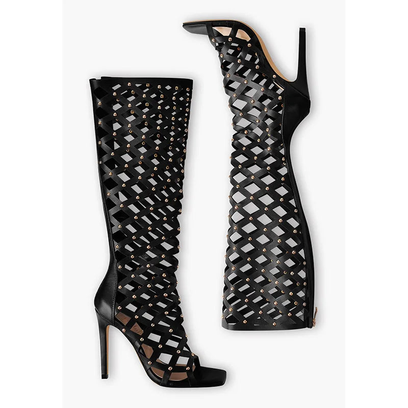 Layout of cutout studded stiletto knee-high boots