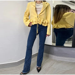 Tailored crop blazer designed with modern sculpted lines
