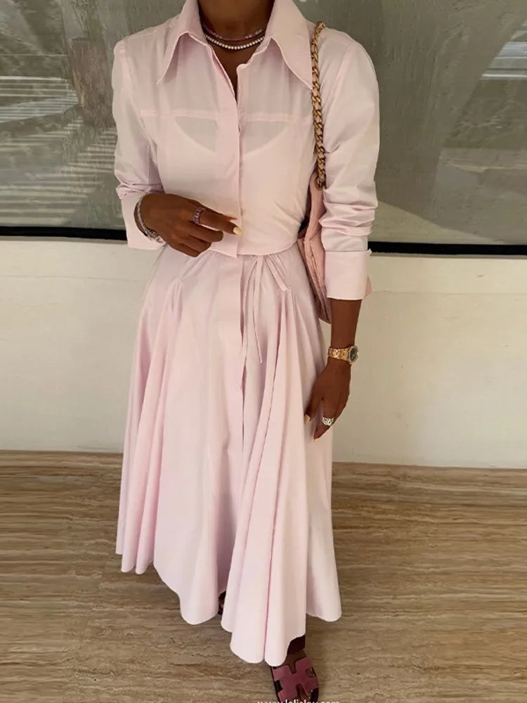 The two-piece outfit worn as a stylish and comfortable beach look.

-pink