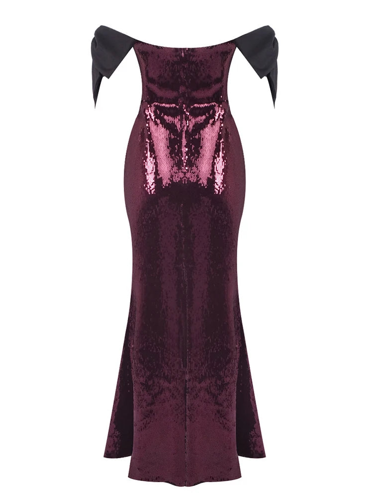 Mauve evening gown with black shoulder accents on a white background