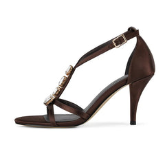 Left side view of brown stiletto heel sandals with ankle strap and crystal detail