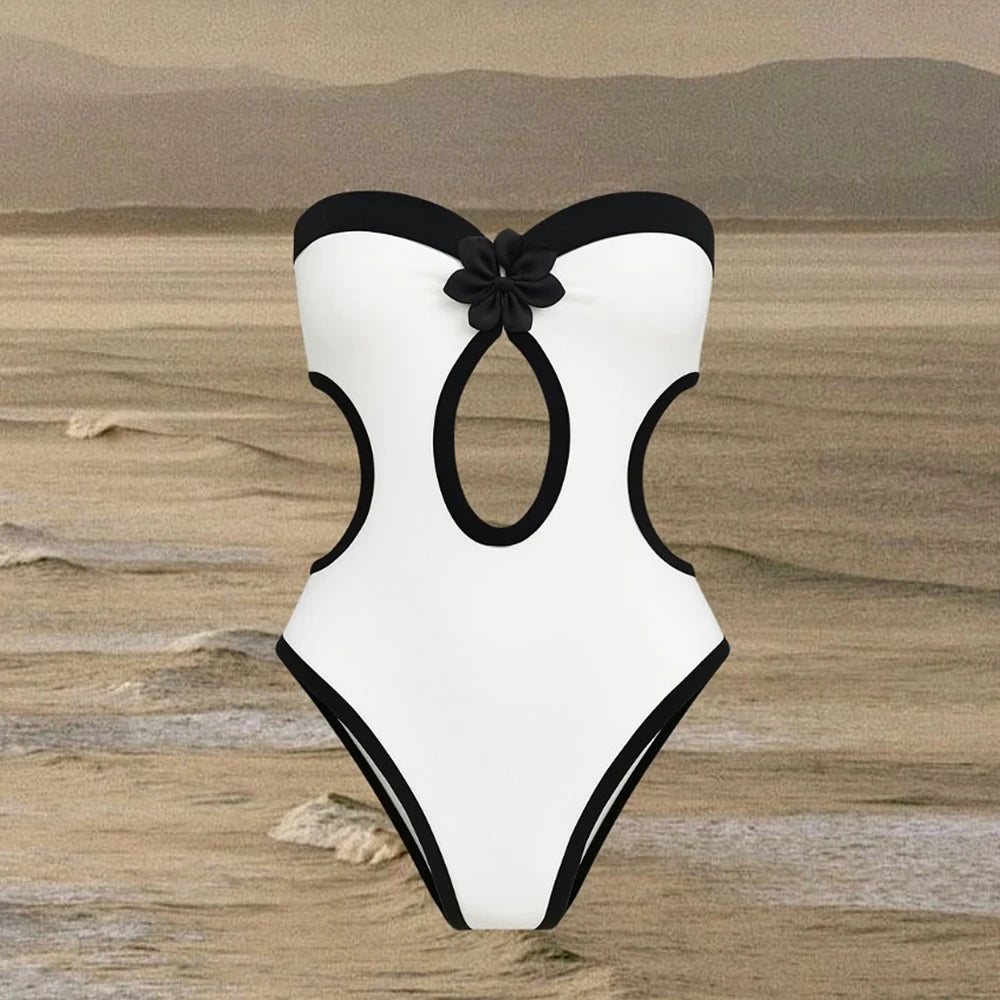 Product shot of one piece swimsuit with cutouts